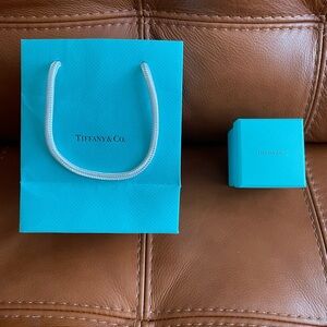 Tiffany and Co. empty ring box and bag